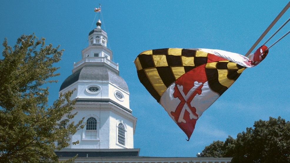 Maryland state capitol building with Maryland flag